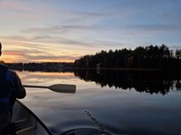 Riverdale had some canoe to rent. View from the lake next to inn