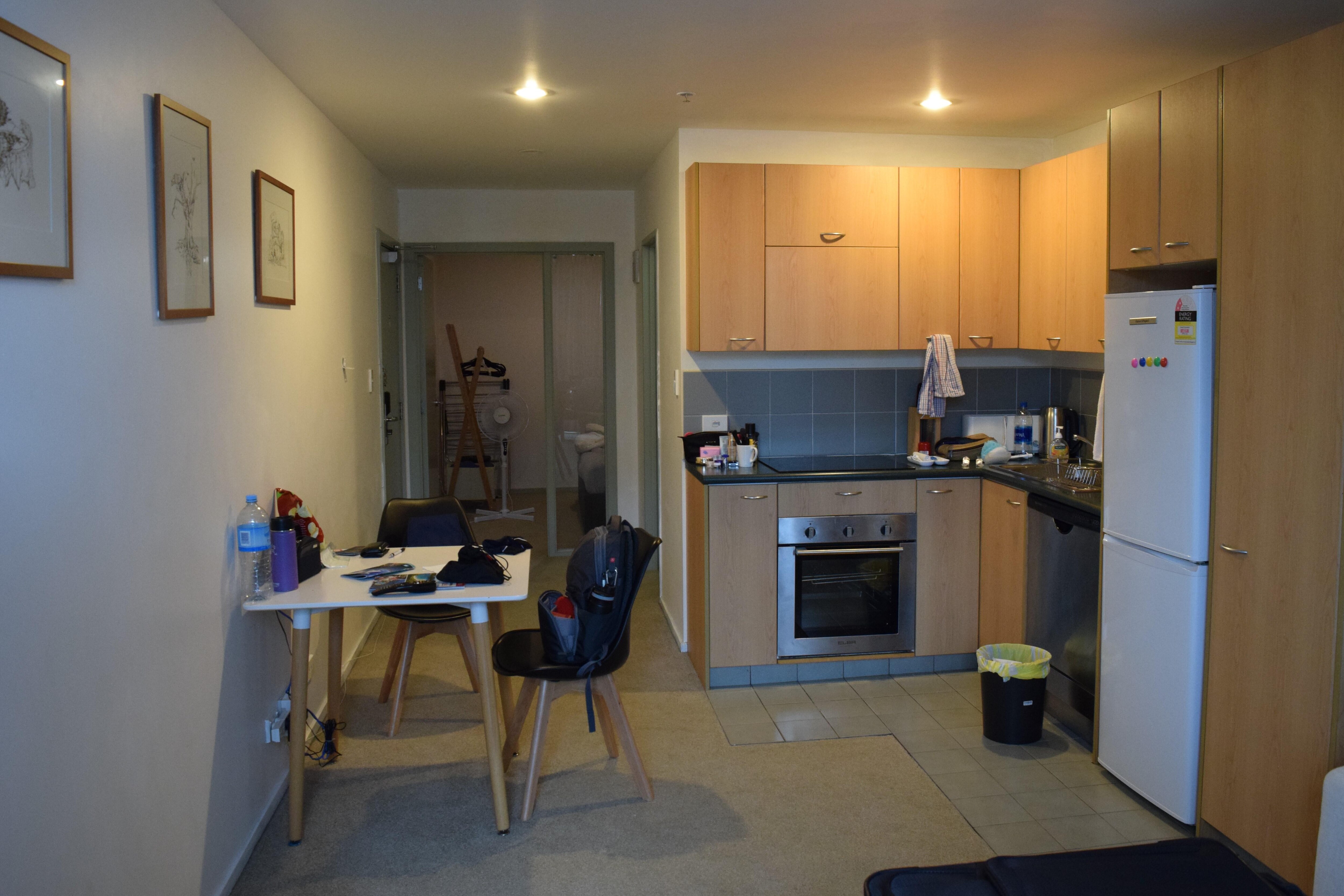 View of main room.  Bed room is far back and very small bathroom behind stove/oven.  No windows in bedroom.  Bathroom door needs to be closed to use sink.