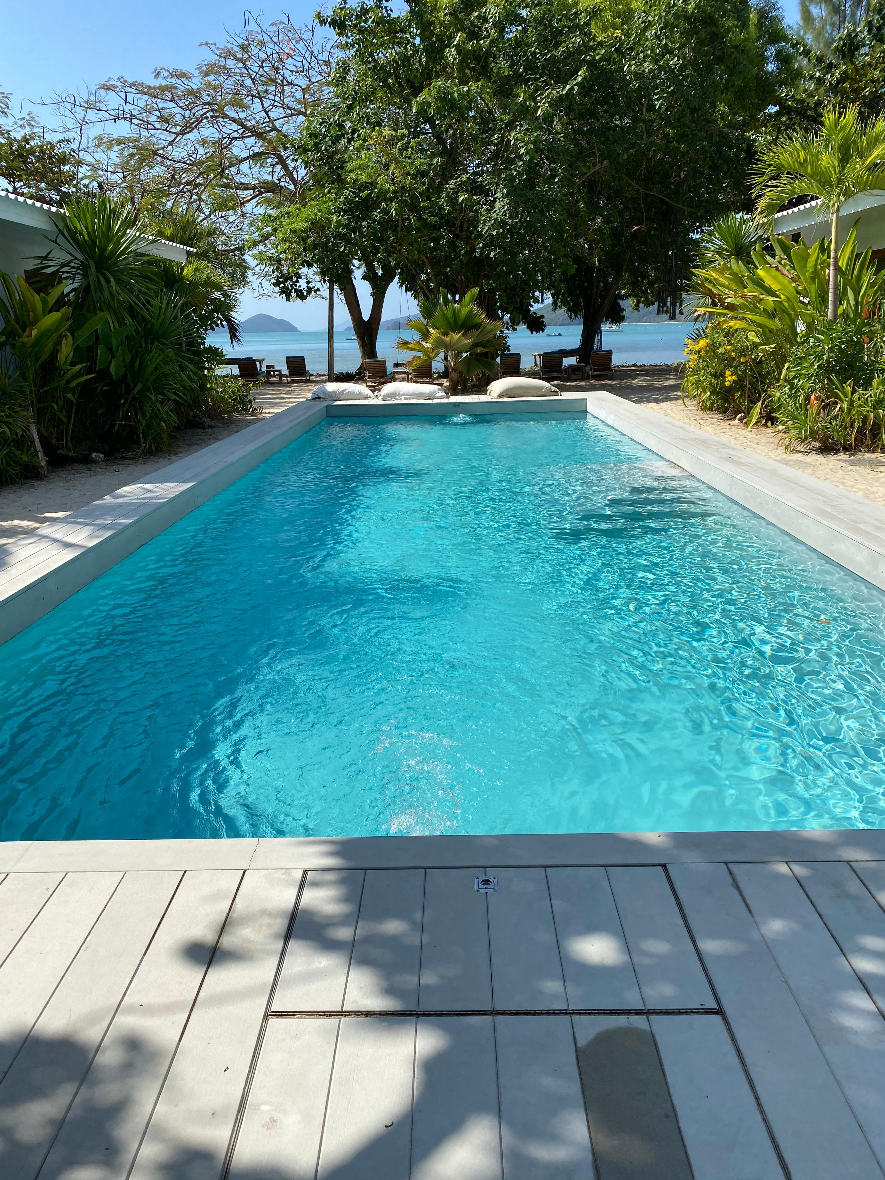 Nice pool that looks into the ocean. 