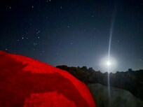 In the jacuzzi shooting the stars, Red lights in the jacuzzi created the red glow on the rocks!
