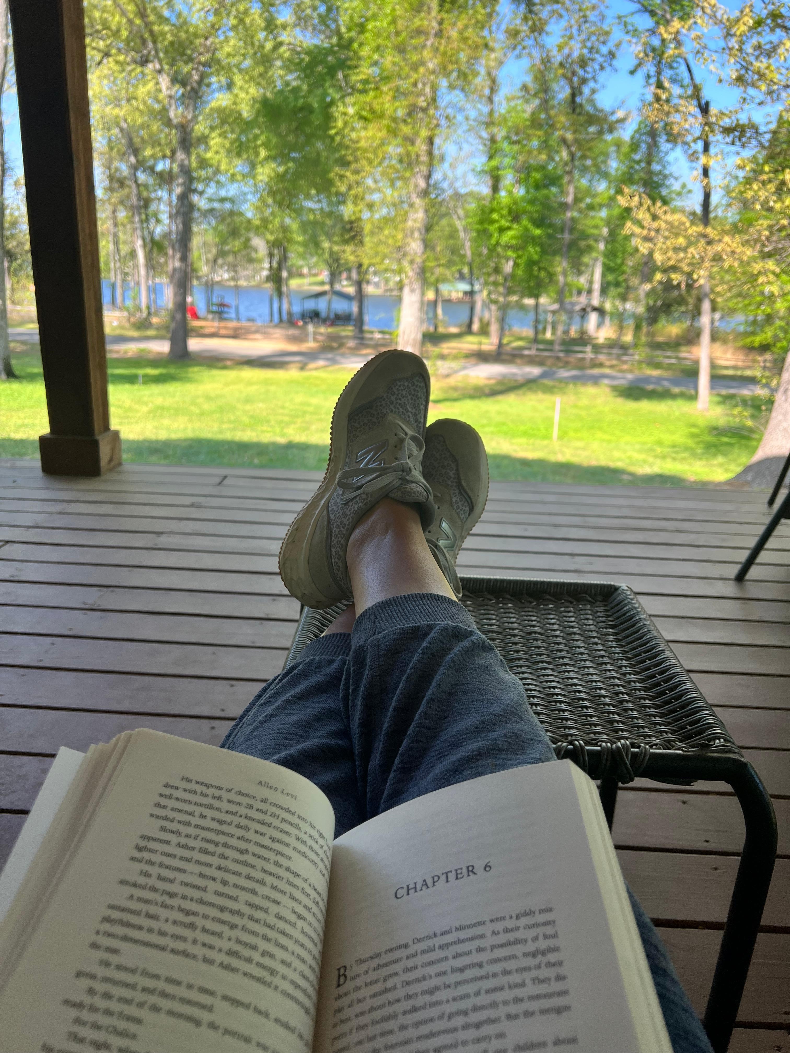 Reading on the front porch enjoying the view!