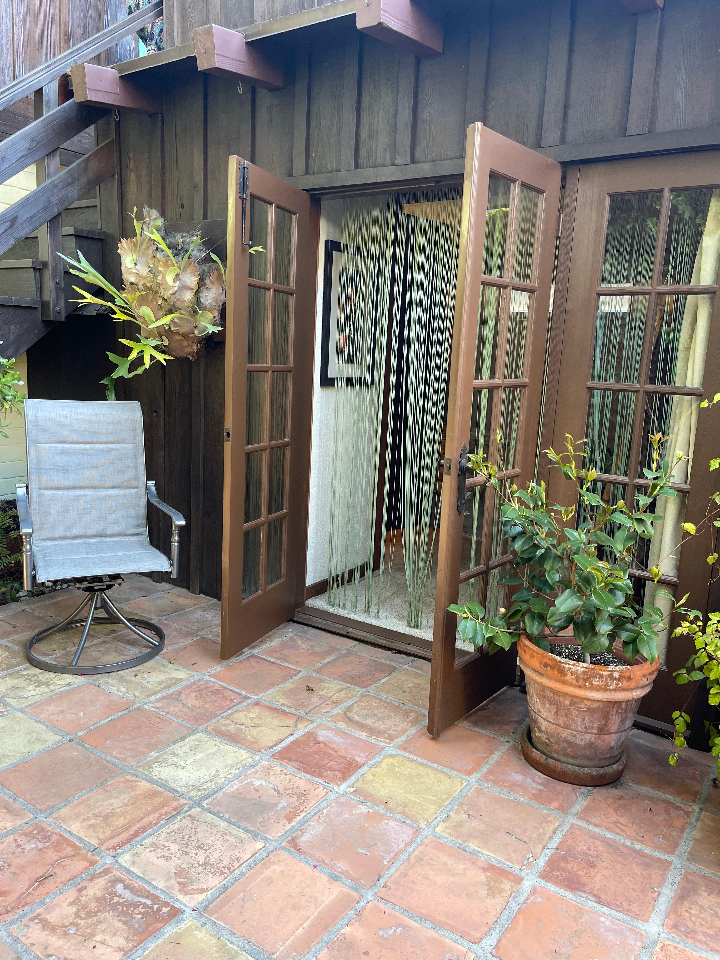 The Beautiful French Doors from the Bedroom to the Courtyard