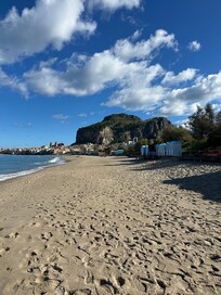 Beach about a block downhill from villa.