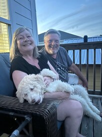 Back deck with my parents and pup, Koda.