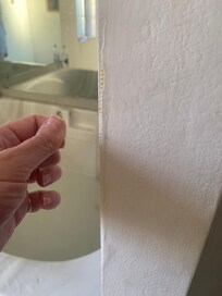 Bead-board showing through walls that need repair