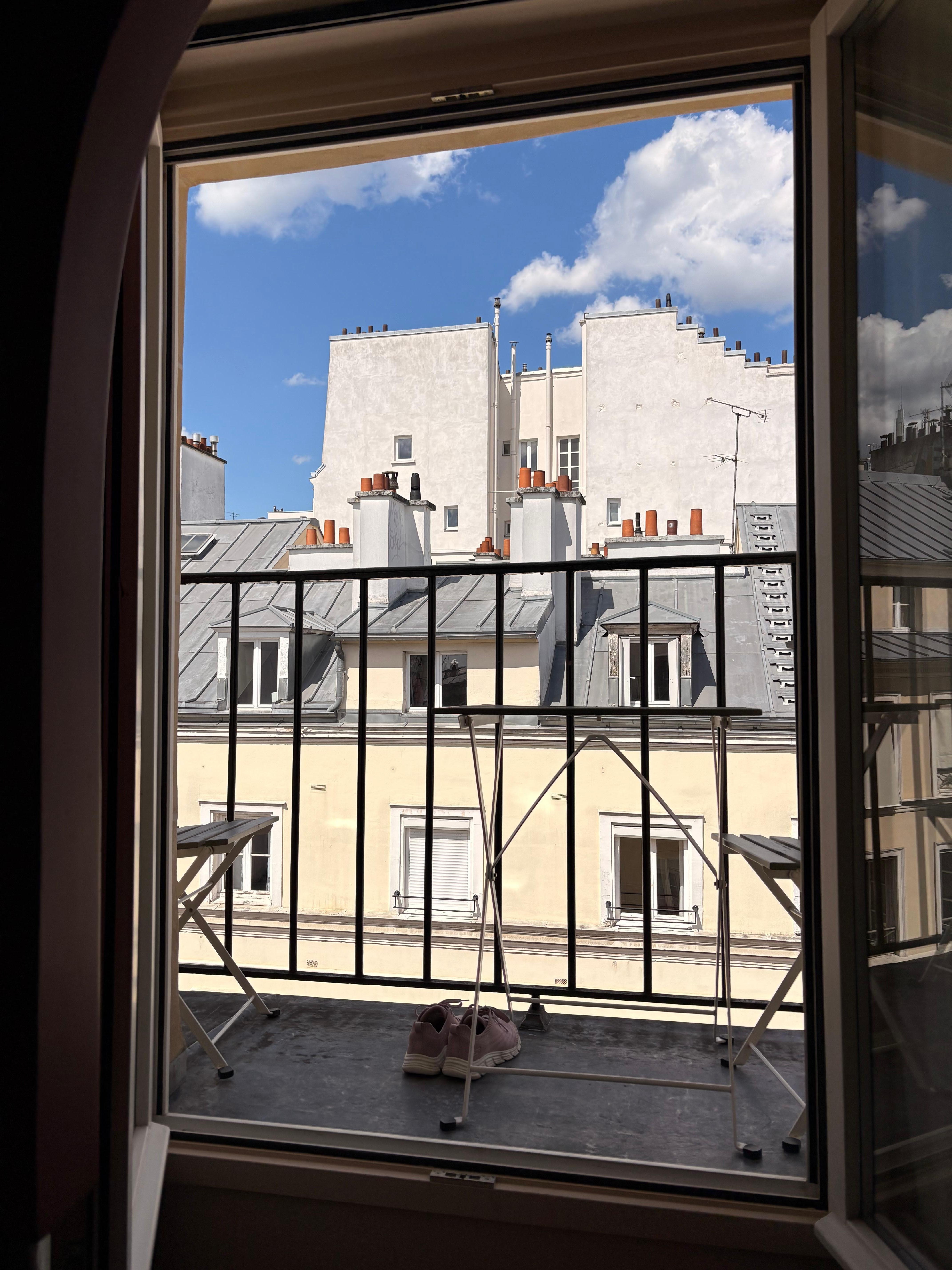 Tiny sitting terrace out of the window. 