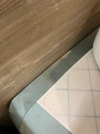 Stained bedsheets and frame