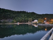 The Salmon River Arms at night.