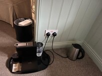 Kettle and coffee machine on window sill with no access to sockets