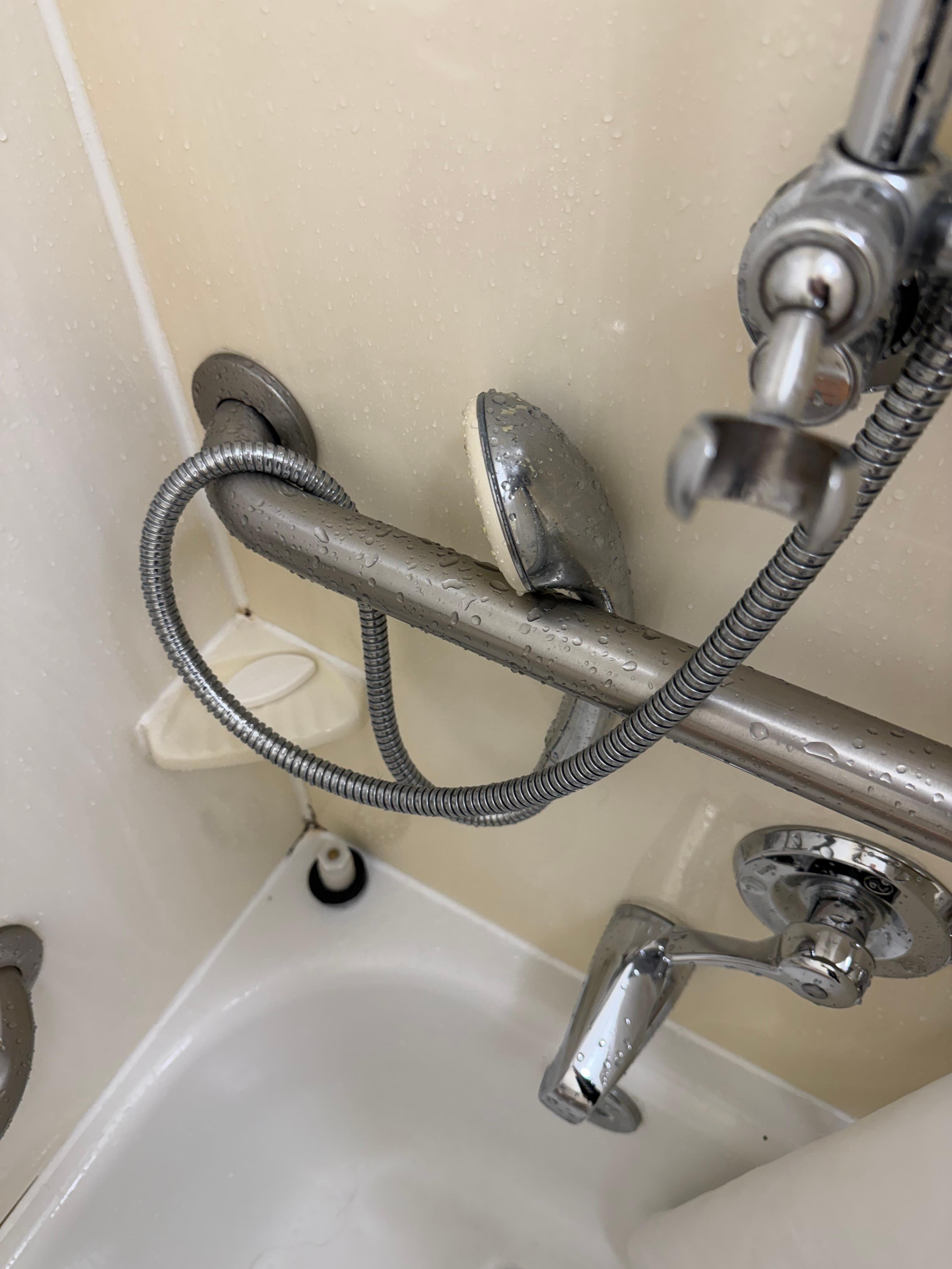 Shower wand with broken holder