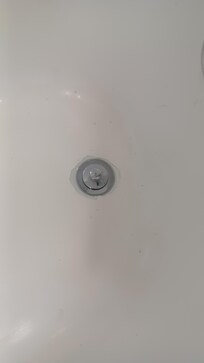 Tub was repainted but the work was not done properly.