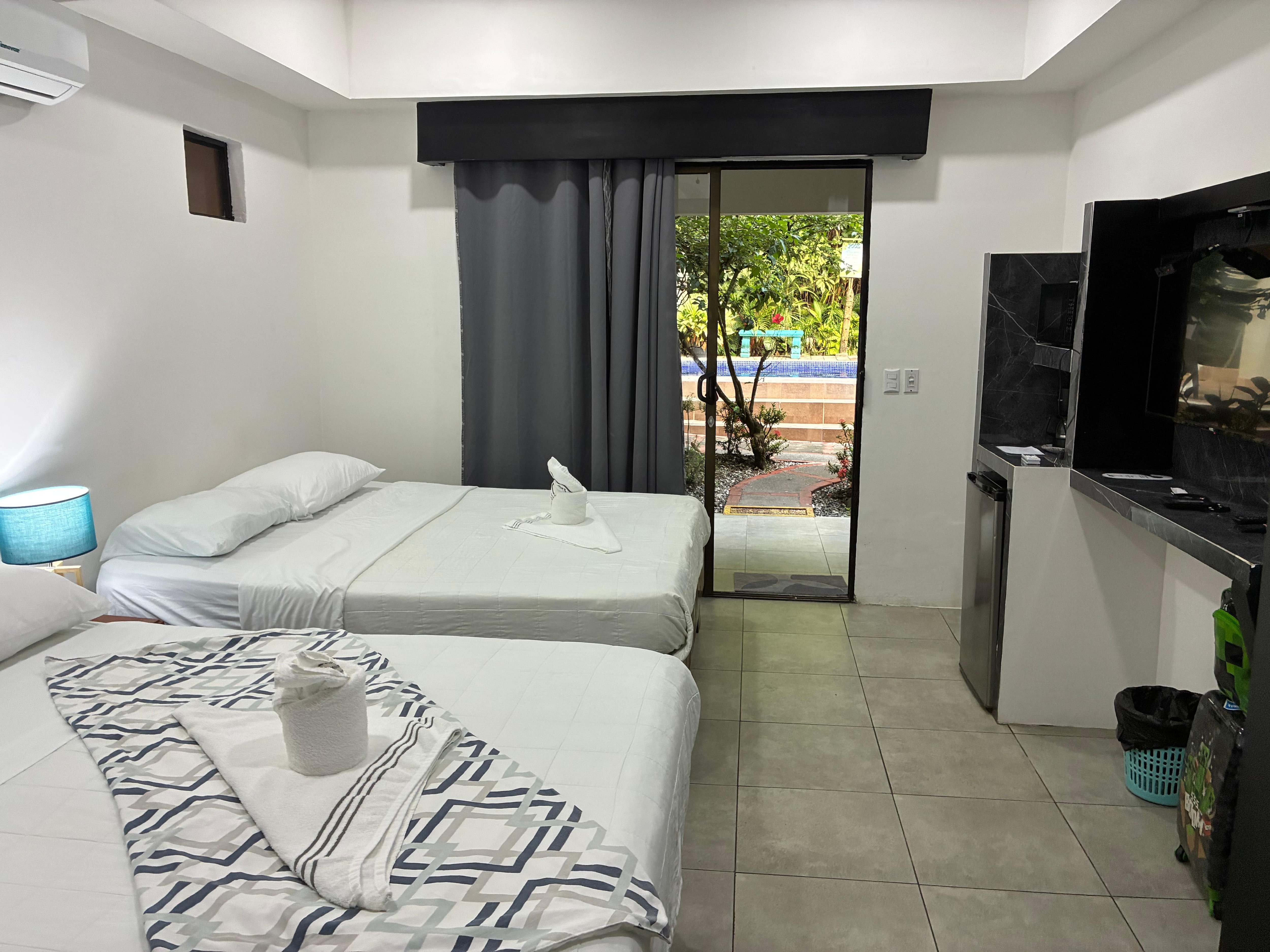 Large beds, mini fridge and microwave, TV with internet