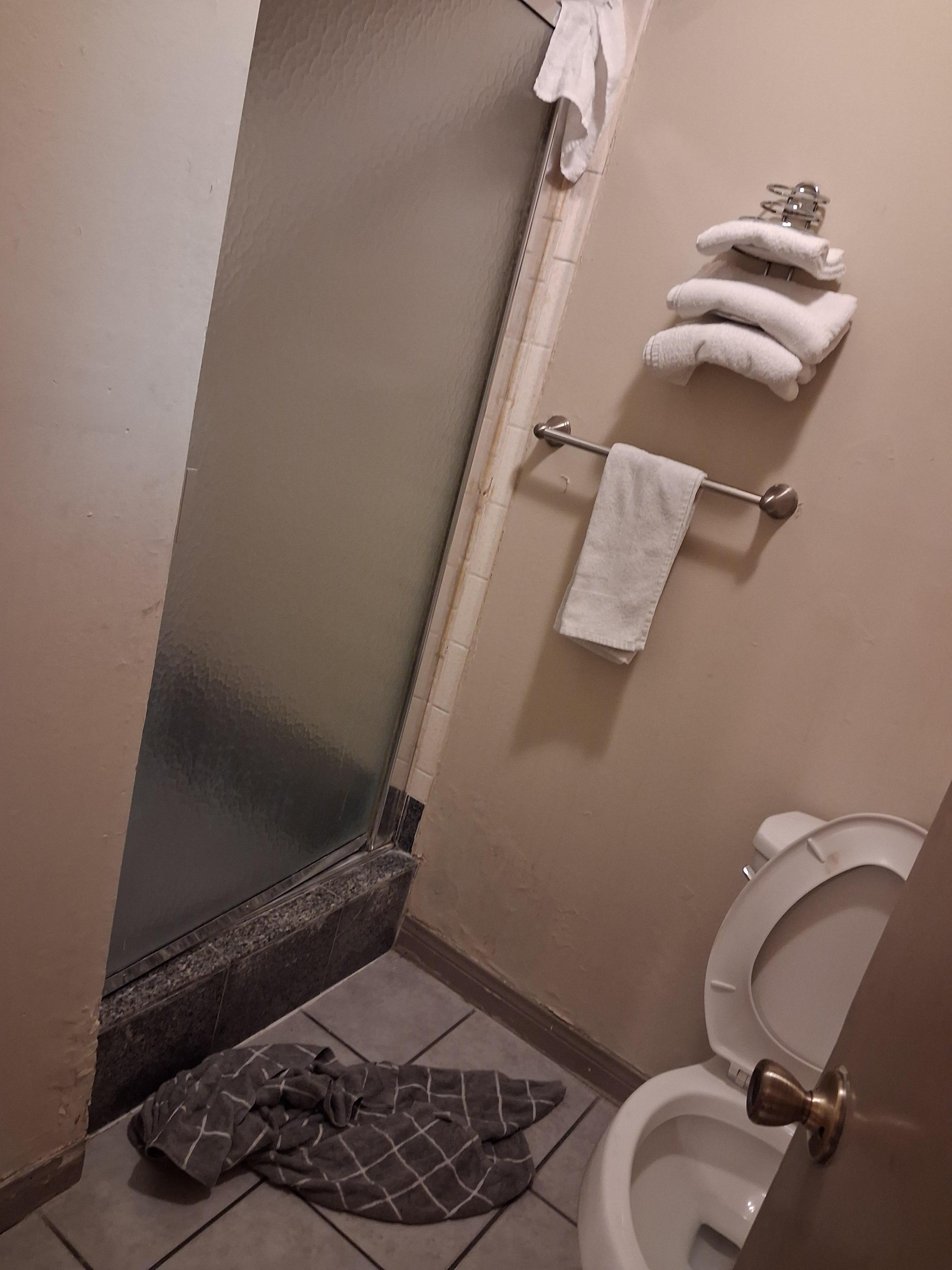 Bathroom and shower no tub in the smaller rooms but lower price