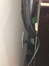 The trash behind the television and the television had no signal