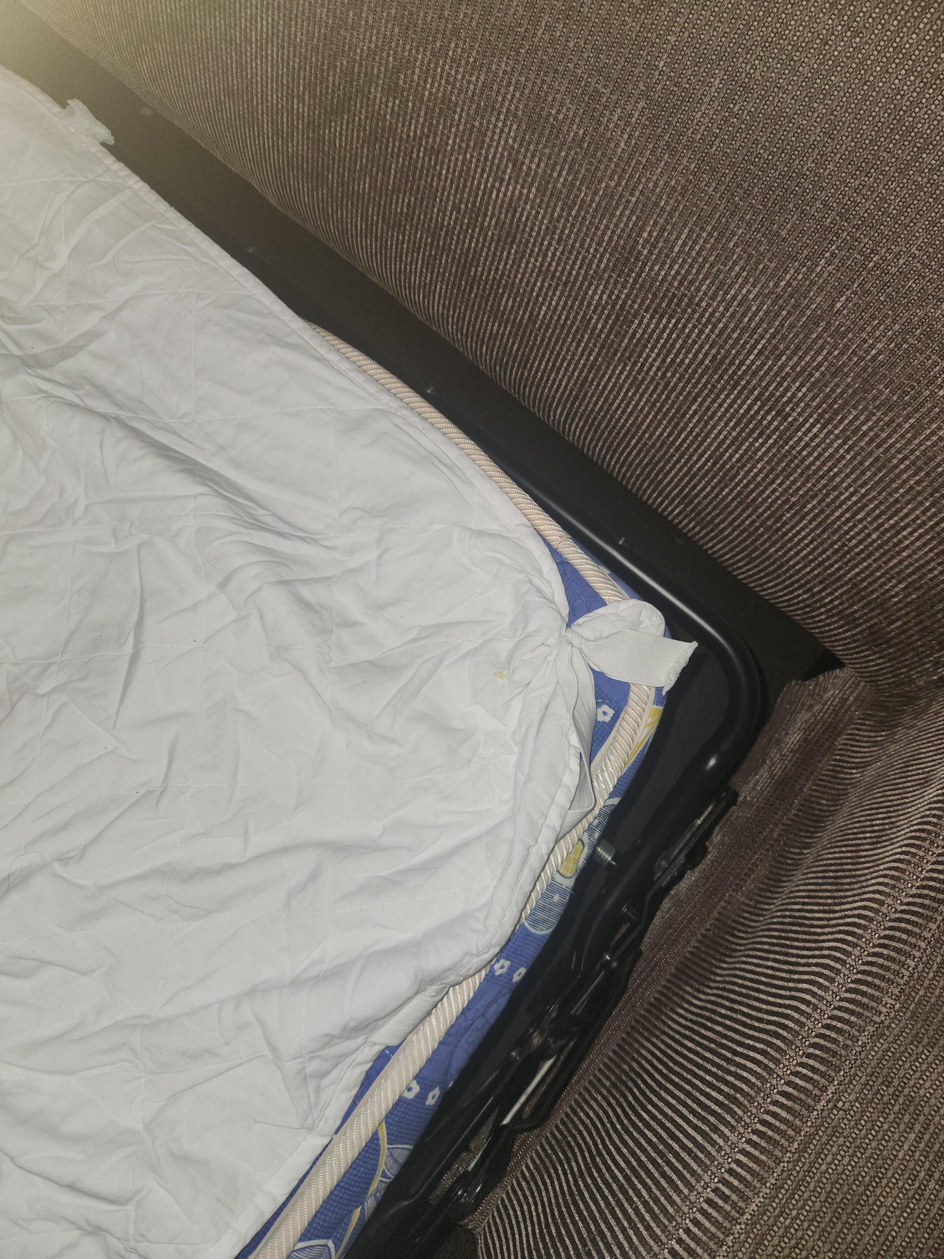 The fold out couch . What a joke. It was found in this state when I unfolded it