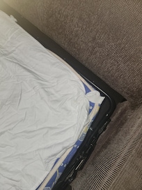 The fold out couch . What a joke. It was found in this state when I unfolded it
