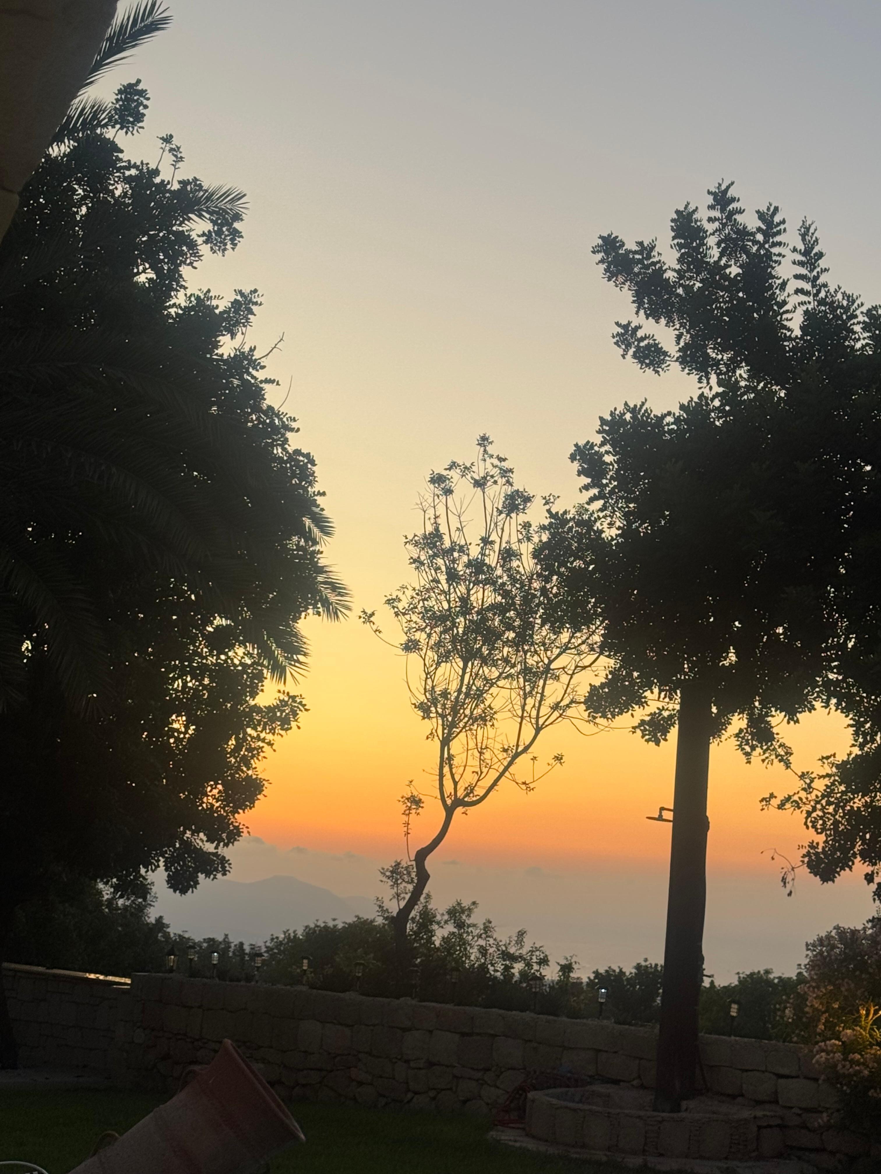 Sunset view overlooking the mountain scenery from the garden 