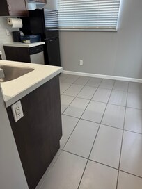 Floor was sticky, and fridge smelled.