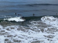 Surfers going at it!