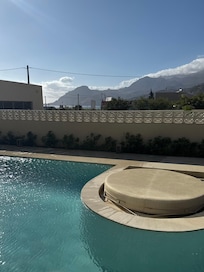 View of pool from our room patio walk out access.