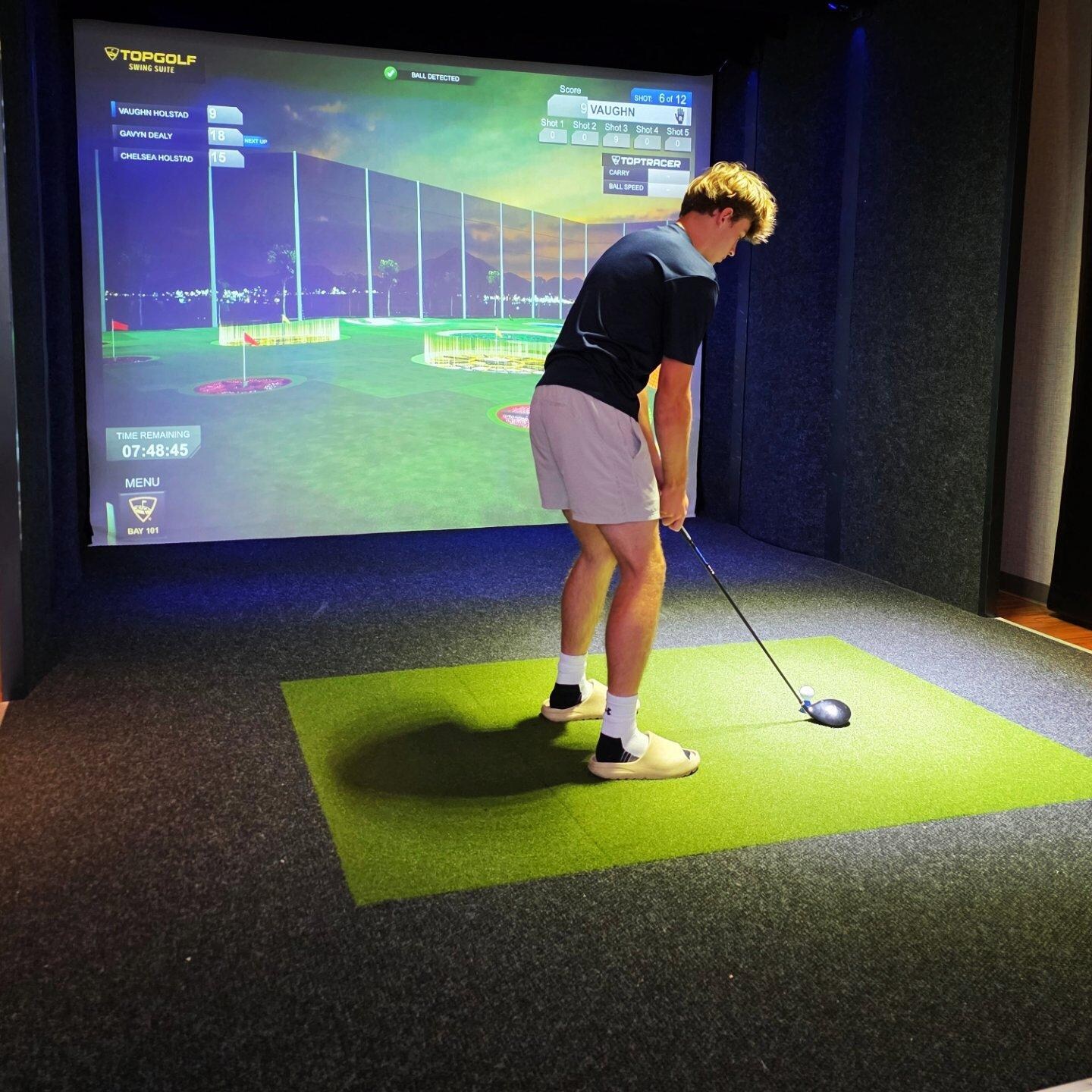 Golf simulator in lobby