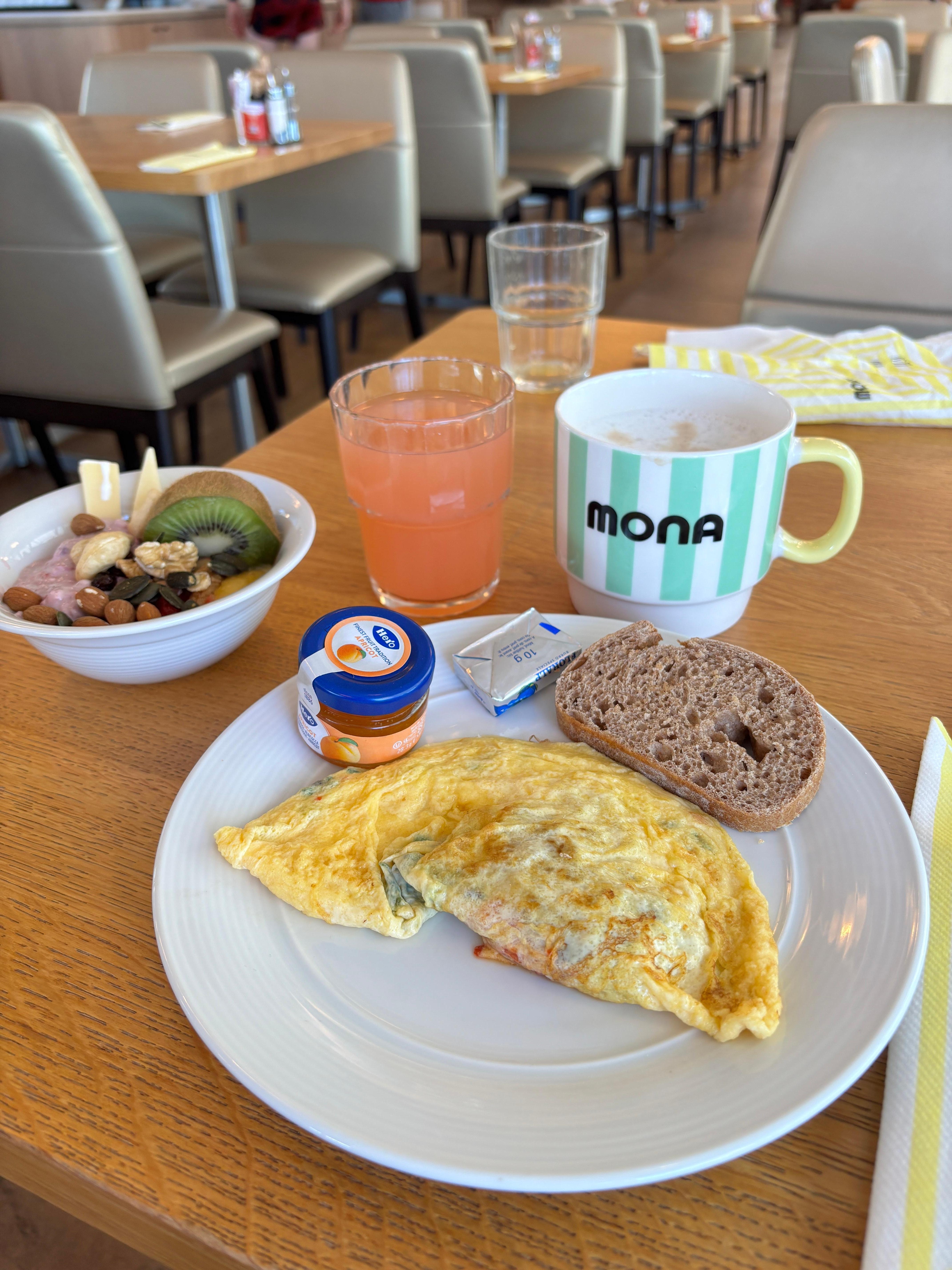 Wonderful breakfast. I just wish I could have fit this adorable coffee mug into my carry-on. I did purchase a Mona travel bag. 