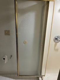 Shower door didn’t have a towel Bar, holes in the glass