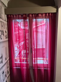 Scaffloding just outside of the only window of the room (inside of the room is directly visible)