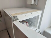 Fridge broken top and bottom, couldn't even open properly.