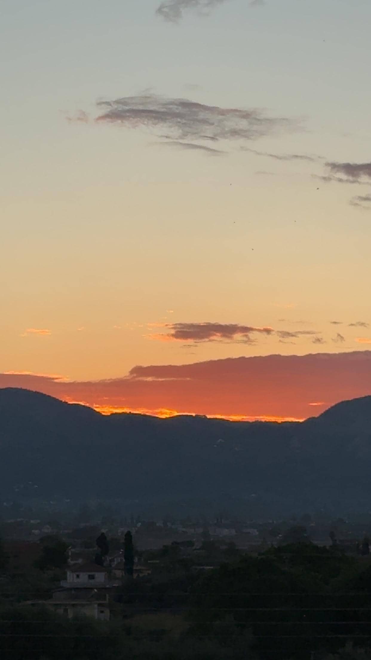 Zonsondergang vanaf balkon
