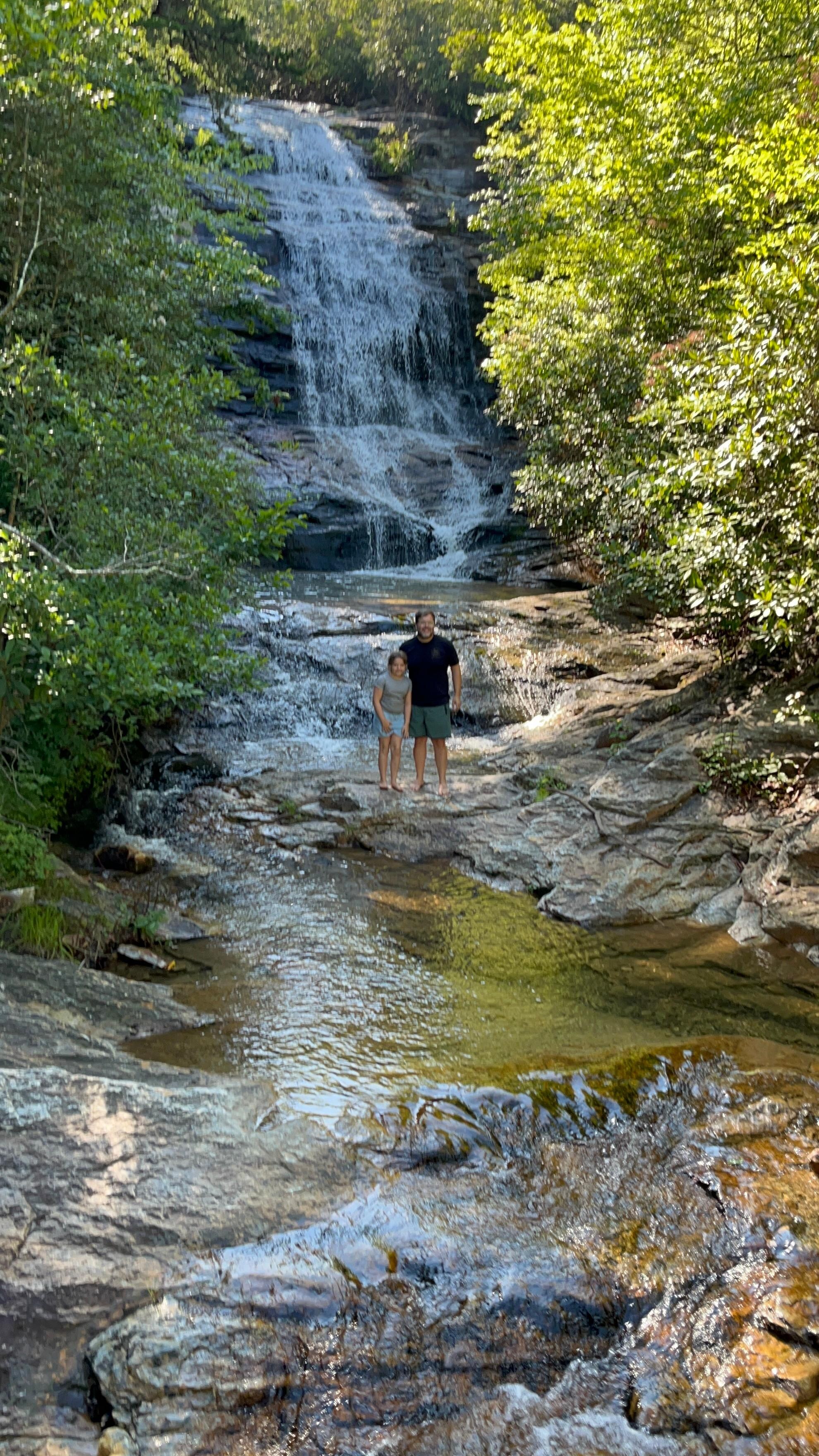 My son and granddaughter at the falls.