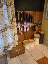 Part of the kitchen, showing some of the things that Colleen provides - coffee, tea so you don't need to worry about that, and creamer! (Also I LOVE the knives).