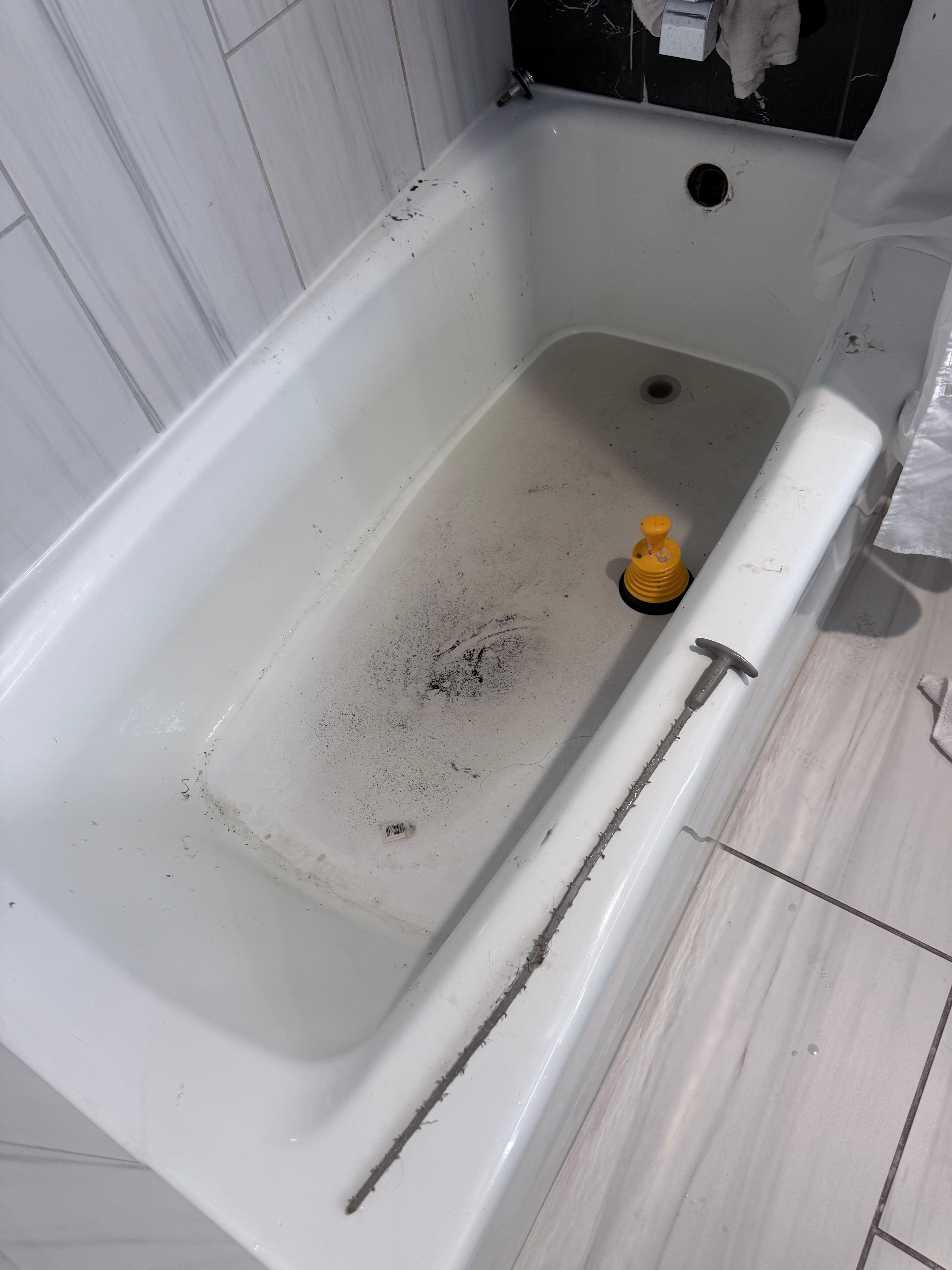 Shower was clogged made mess all over bathroom 