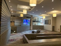 Unique layout with a sports game on each tv