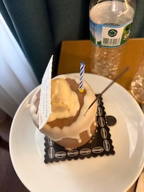 Hotel management celebrates my birthday with a cake and fireworks and candles. How wonderful.