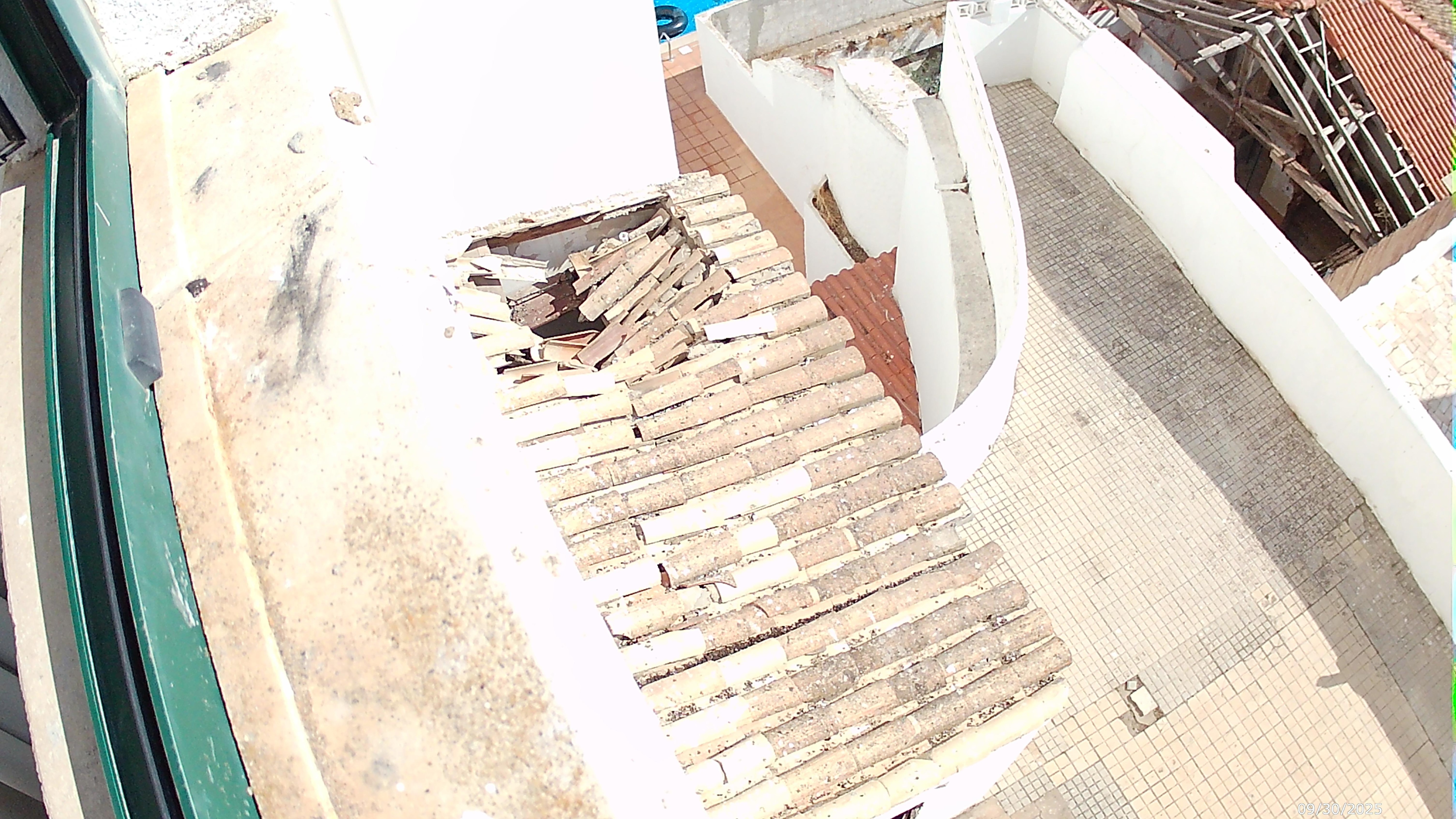 This shows the derelict roof of an out building below our room window that belonged to the hotel, that was infested with pigeons.