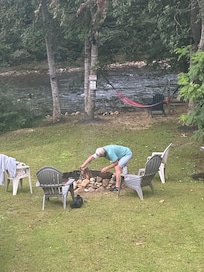 I’m standing up by the stairs, going down to the river.