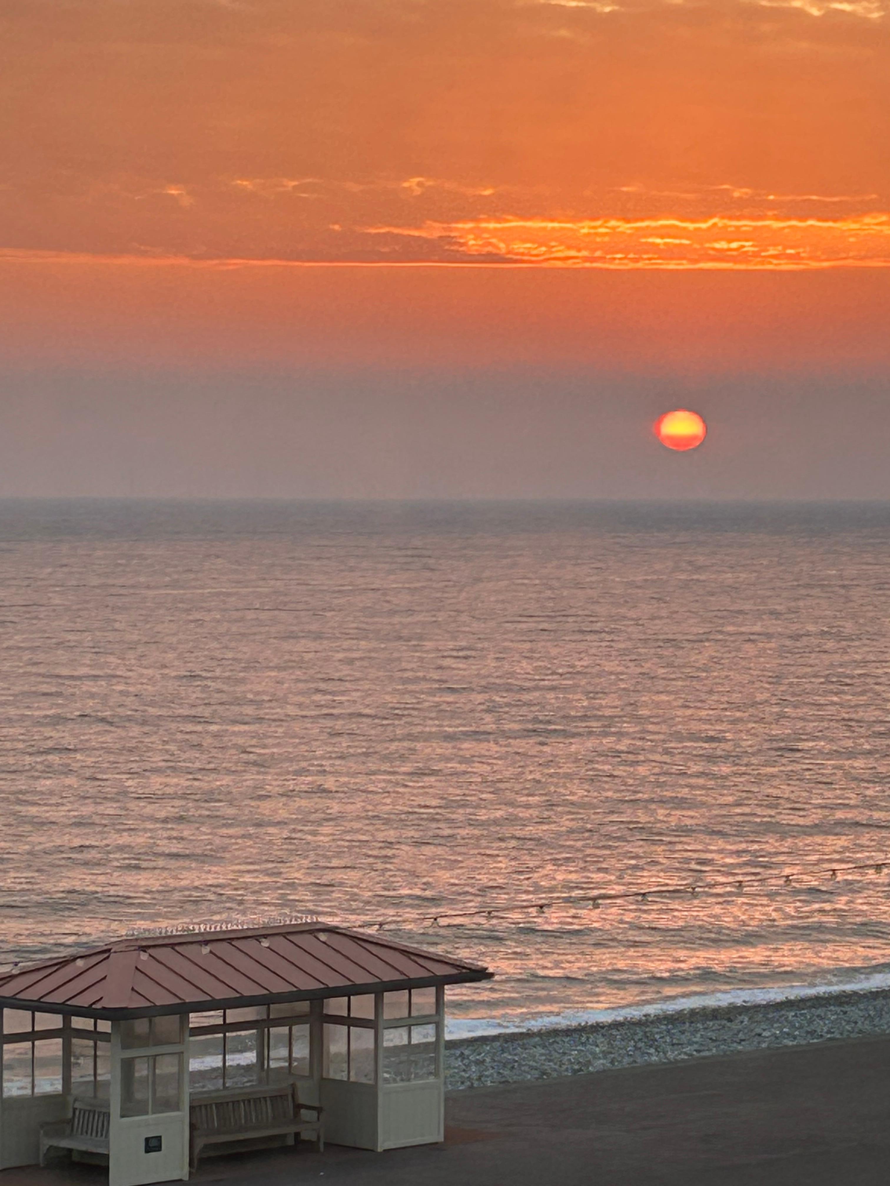 Watching the sunrise from the Marine Hotel, Llandudno