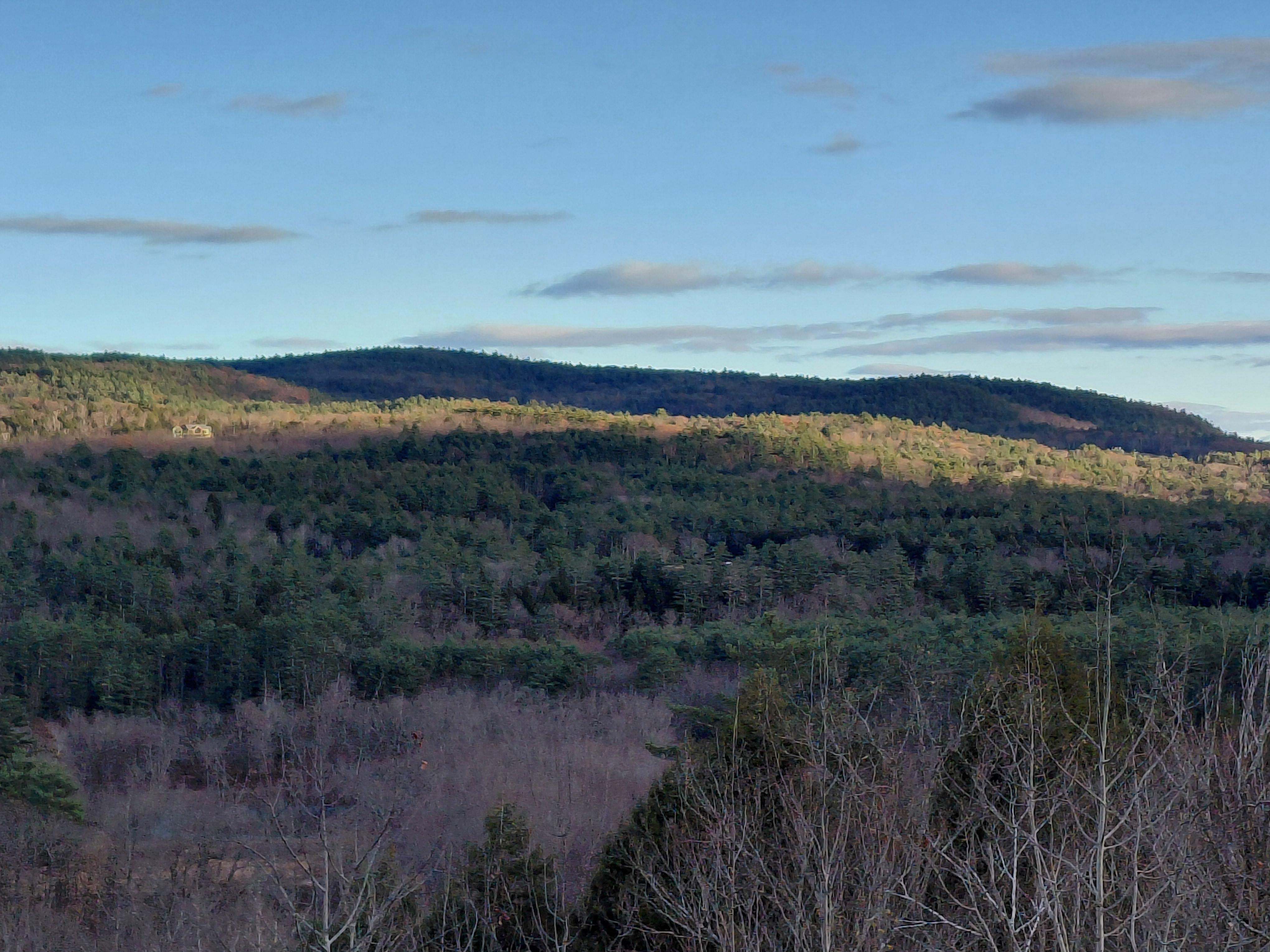 Mid morning sun over mountains