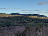 Mid morning sun over mountains