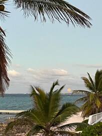 Moonrise from the gorgeous and well–appointed beachfront.
