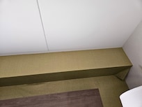 Wallpaper peeling in several rooms.