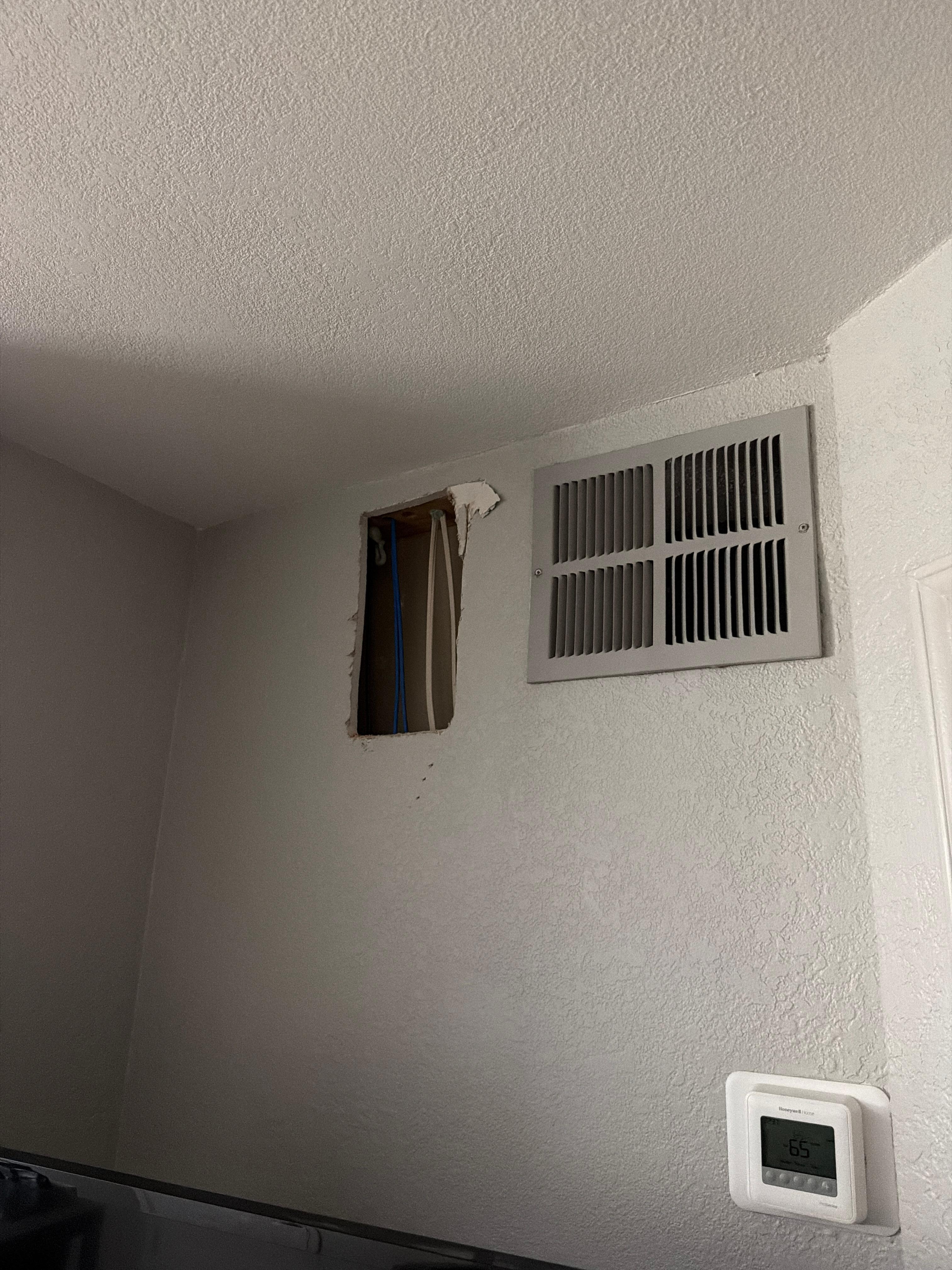 This is the hole in the wall that was made but never filled.  Who cuts a whole in the wall and just leaves it.  Is this the "home-like amenities" that was advertised on the front end?