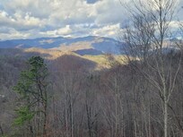 Our morning veiw with the sun peeking on the mountain tops from the deck