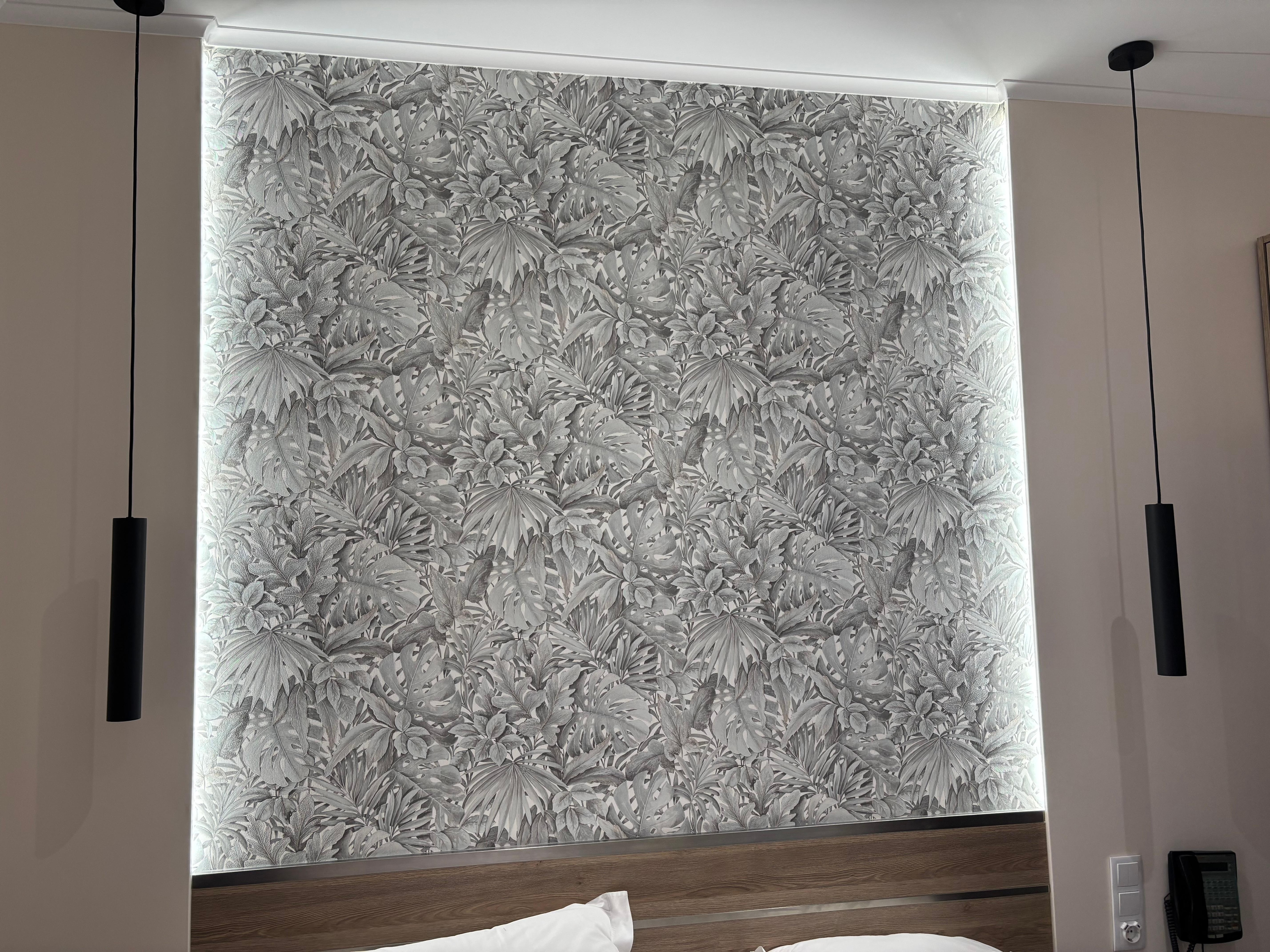 Most impressed by the decor above the bed with beautiful lighting and design. 