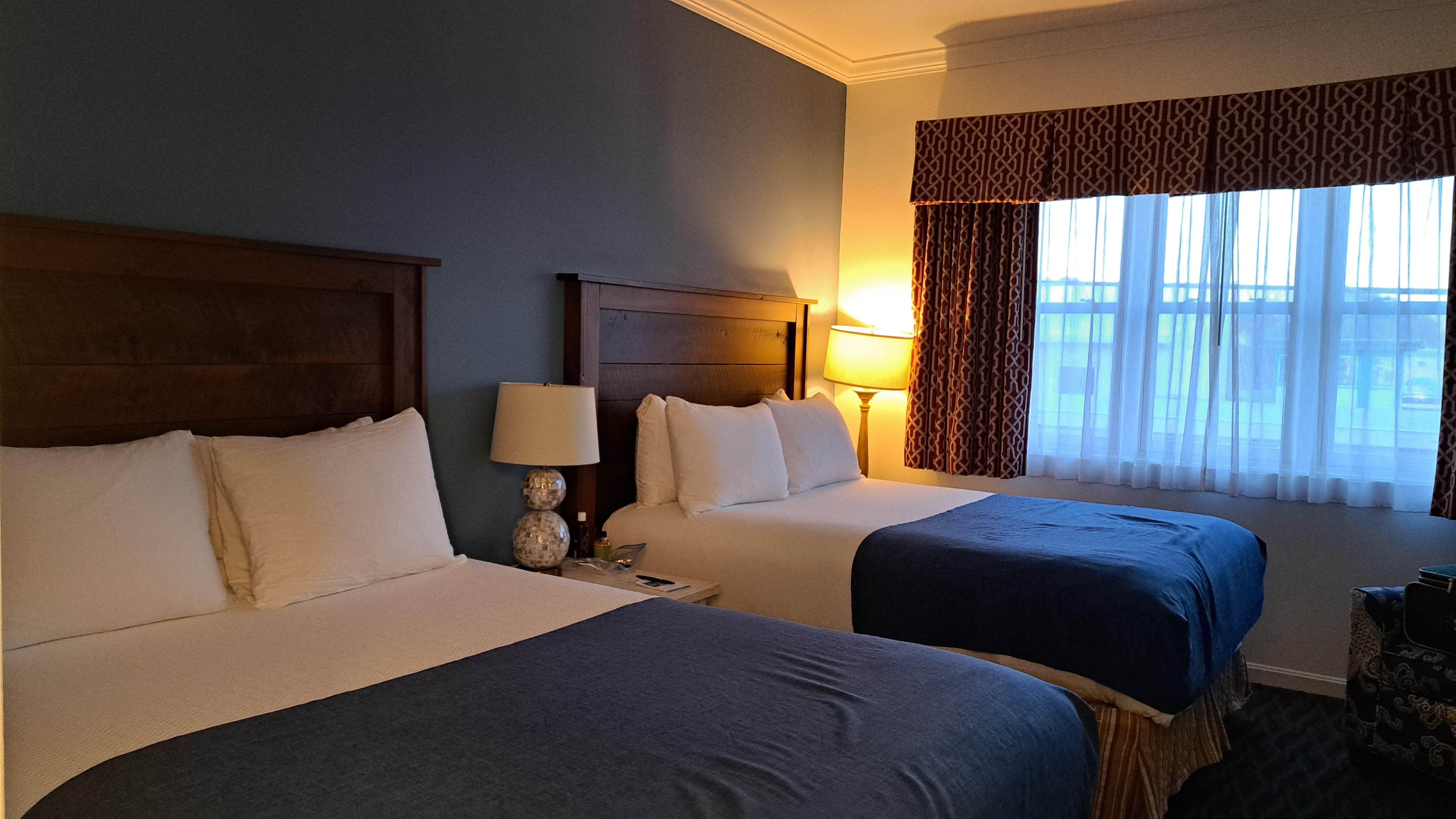 Bedroom section of suite. The suite is in 3 distinct sections, separated by sliding doors - living area, bathroom/vanity, and sleeping area.