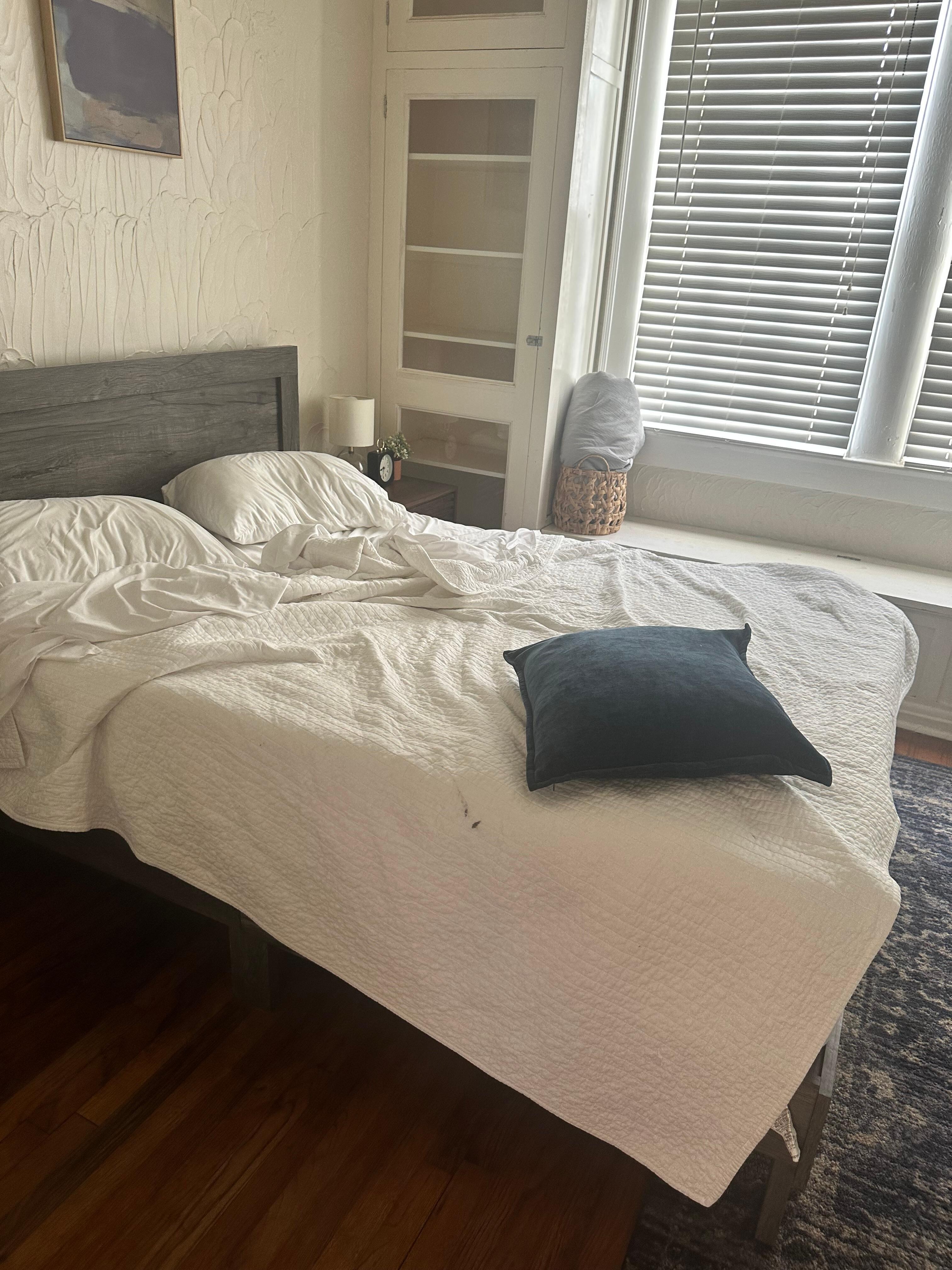 Dirty unmade bed 