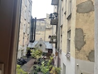 View from the flat into the scruffy courtyard