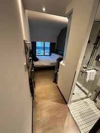 Single Room @ Room#810 - a small room with a large bed that can sleep 2 & has a city view