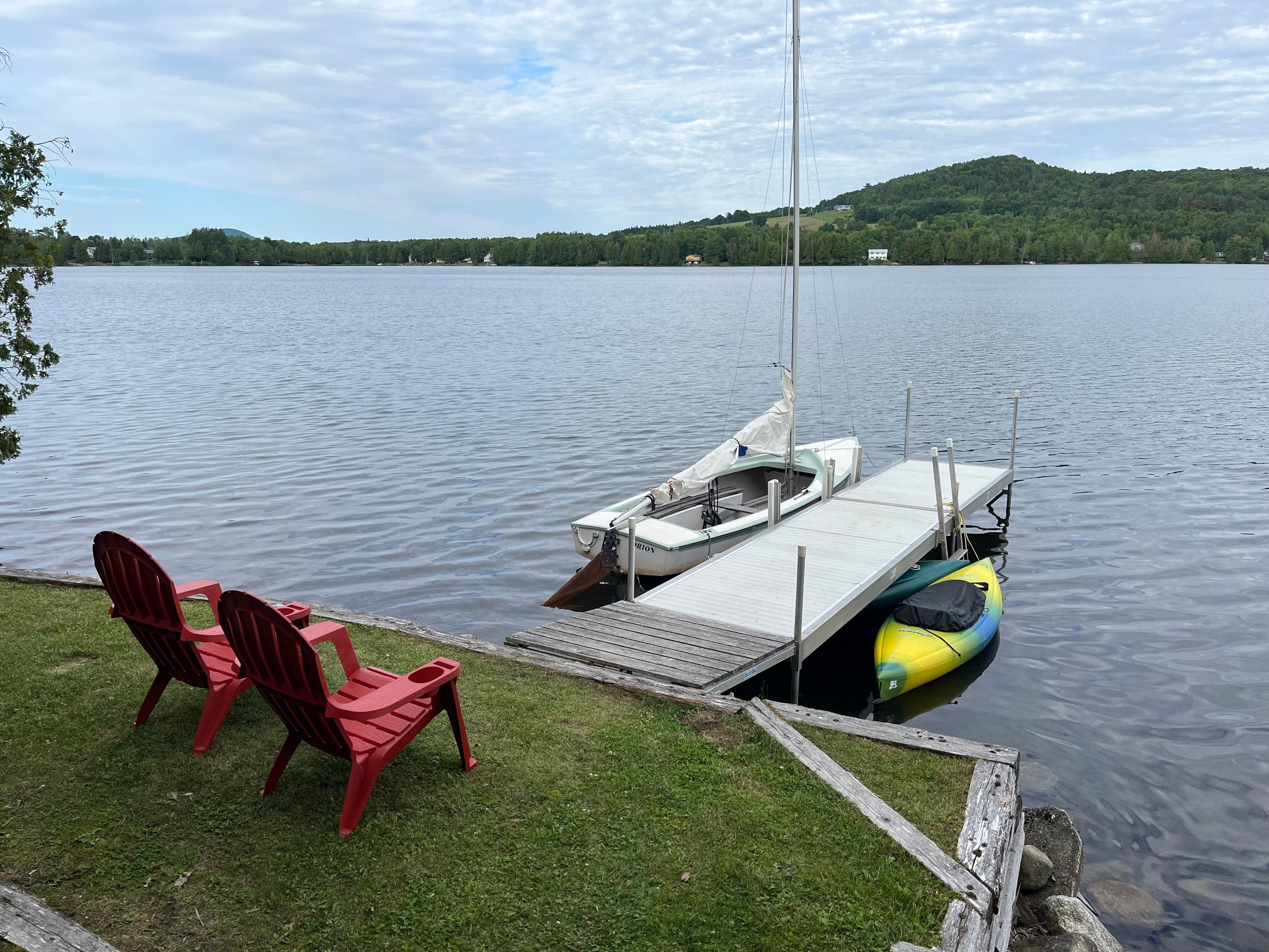 Here is the dock with a nice view. And the boats and two welcoming chairs. Ahhhh!!
